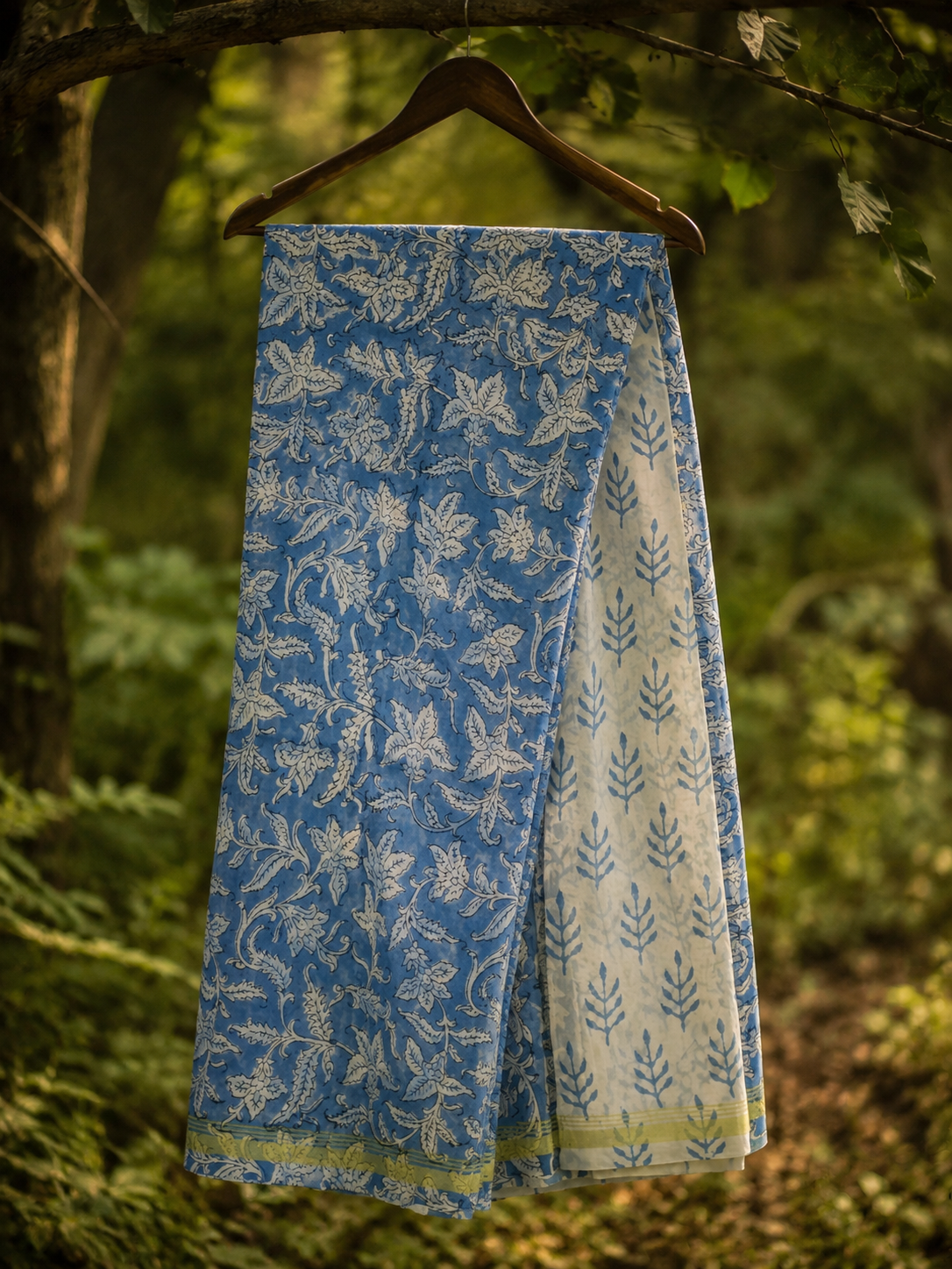 Blue Chanderi suit set featuring traditional floral hand block print and elegant zari border.