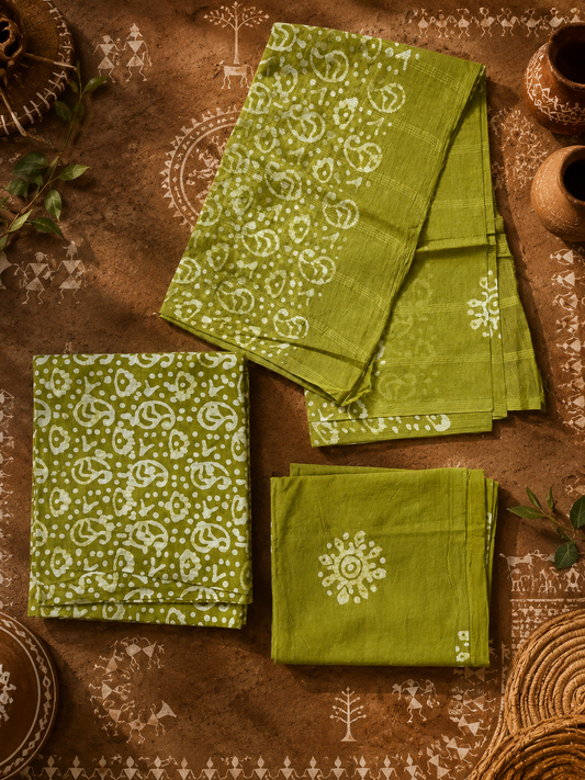 Complete green cotton suit set featuring traditional hand block printed kurta, bottom and dupatta.