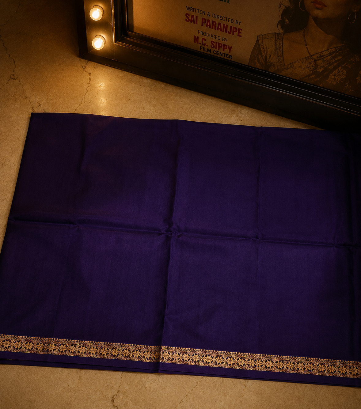 Premium royal purple Chanderi saree with smooth handwoven texture and elegant gold border craftsmanship.